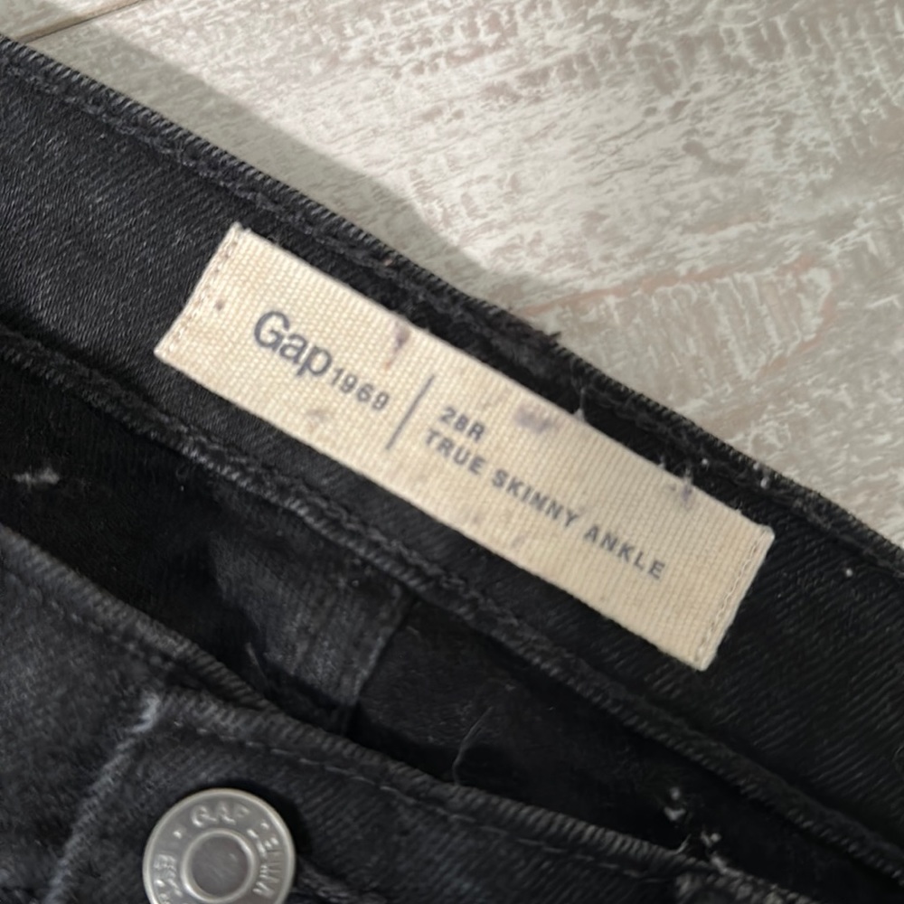 Gap mid rise skinny black jeans with velvet tuxedo stripe.